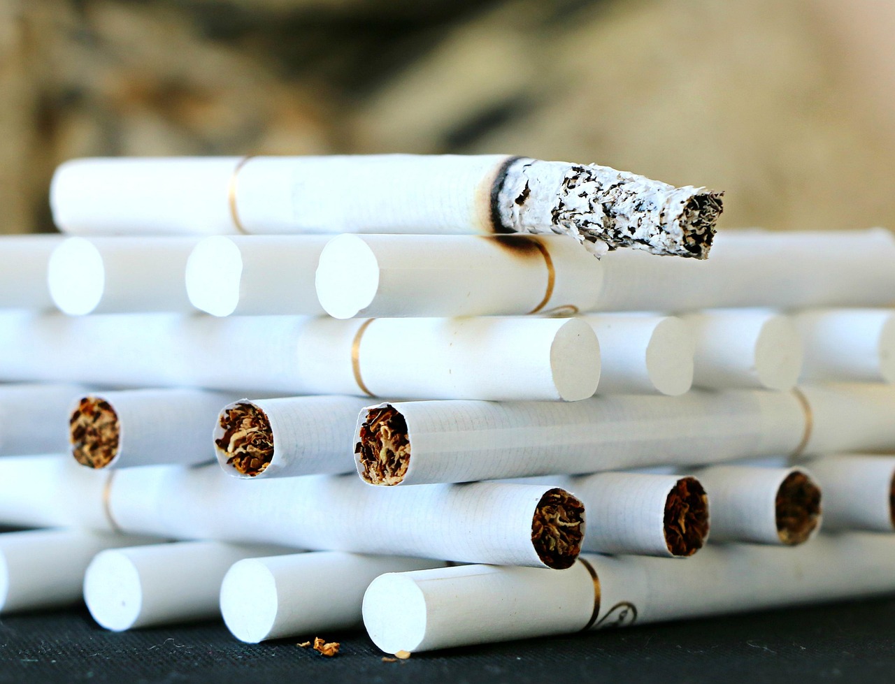 Cigarette, stack, ash — NY Health Insurance Metal Plans Explained