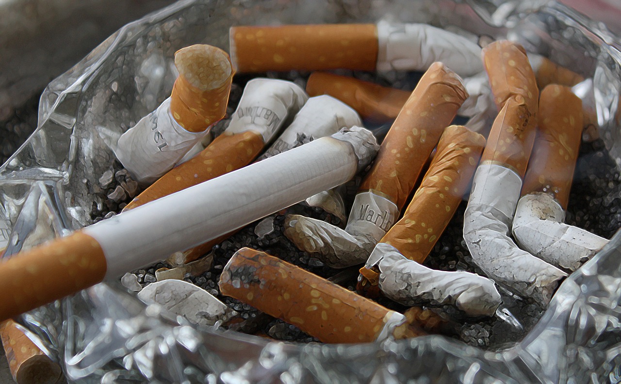 Cigarettes, ashtray, ash — Reason To Hire A Lawyer Rather Than Handling A Medical Malpractice Law Suit All By Yourself